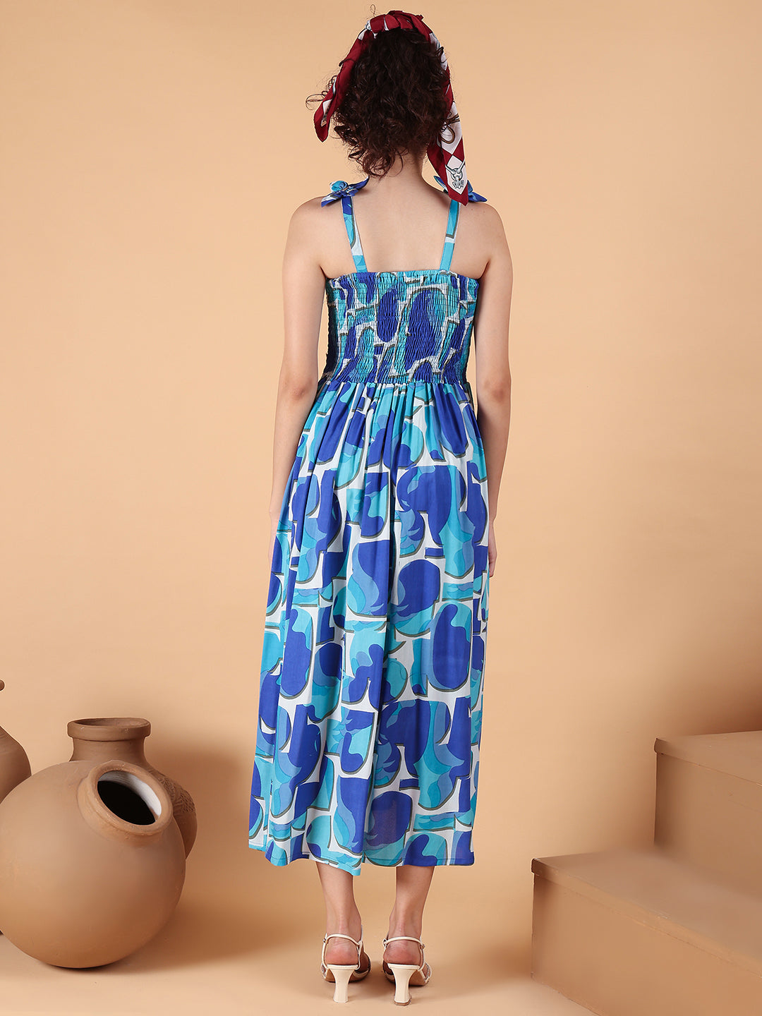 Aawari Blue Abstract Printed Rayon Bobbin dress with Tie-Up Straps - Western Wear